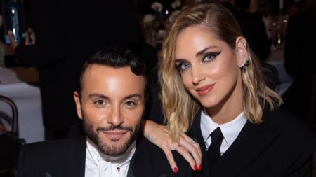 Fabio Maria Damato e Chiara Ferragni sorridenti a una serata