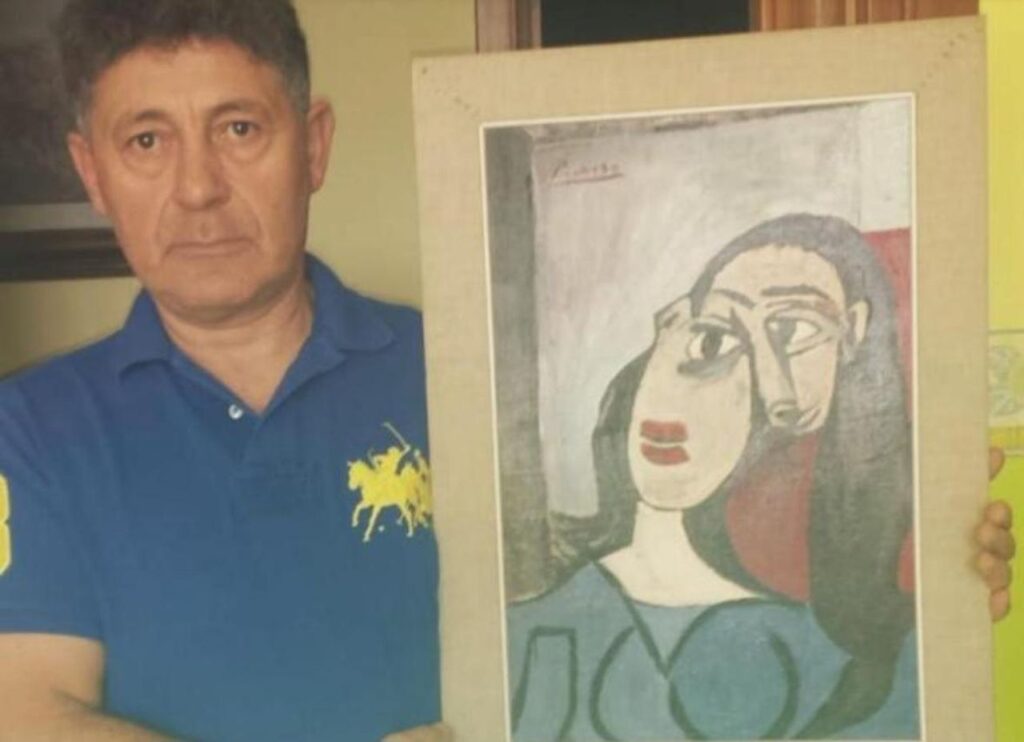 Andrea Lo Rosso con il quadro di Picasso