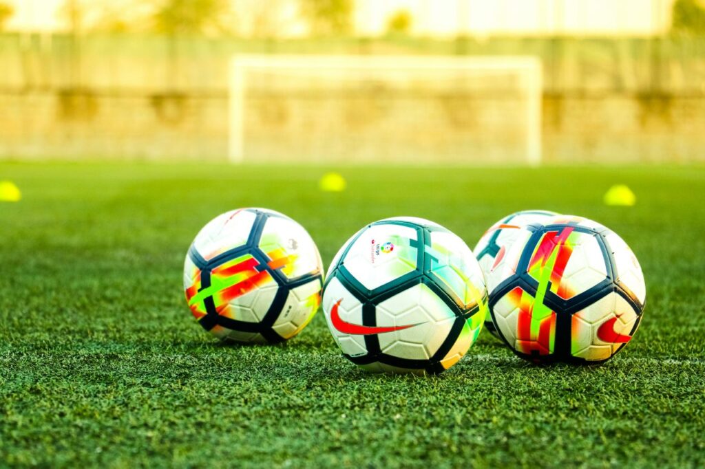 tre palloni di calcio