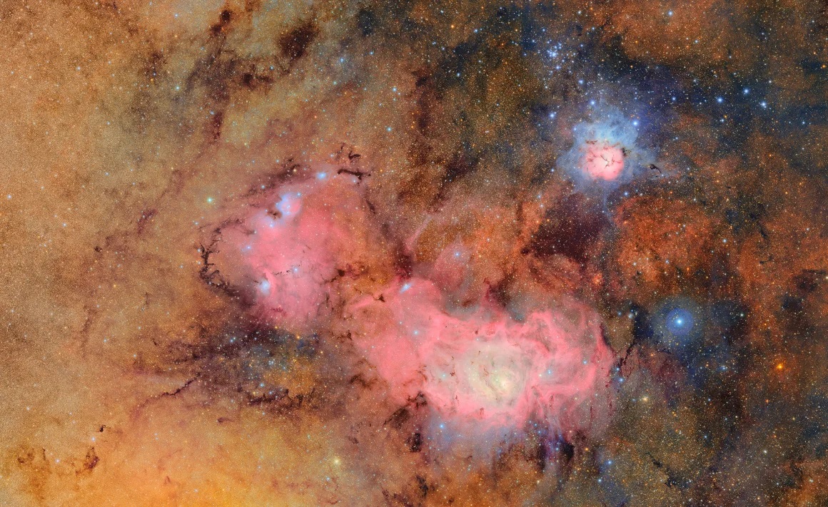Una spettacolare immagine di Vera Rubin le nebulose Trifid e Lagoon