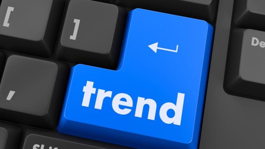Tasto invio con la scritta trend